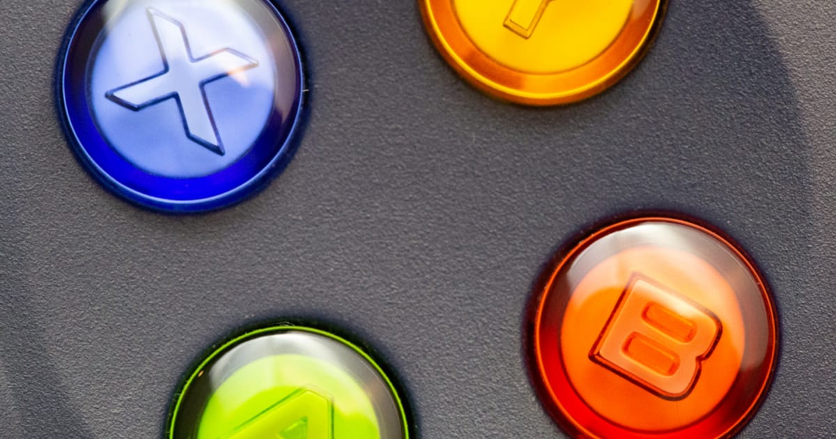 Four coloured face buttons on a game controller